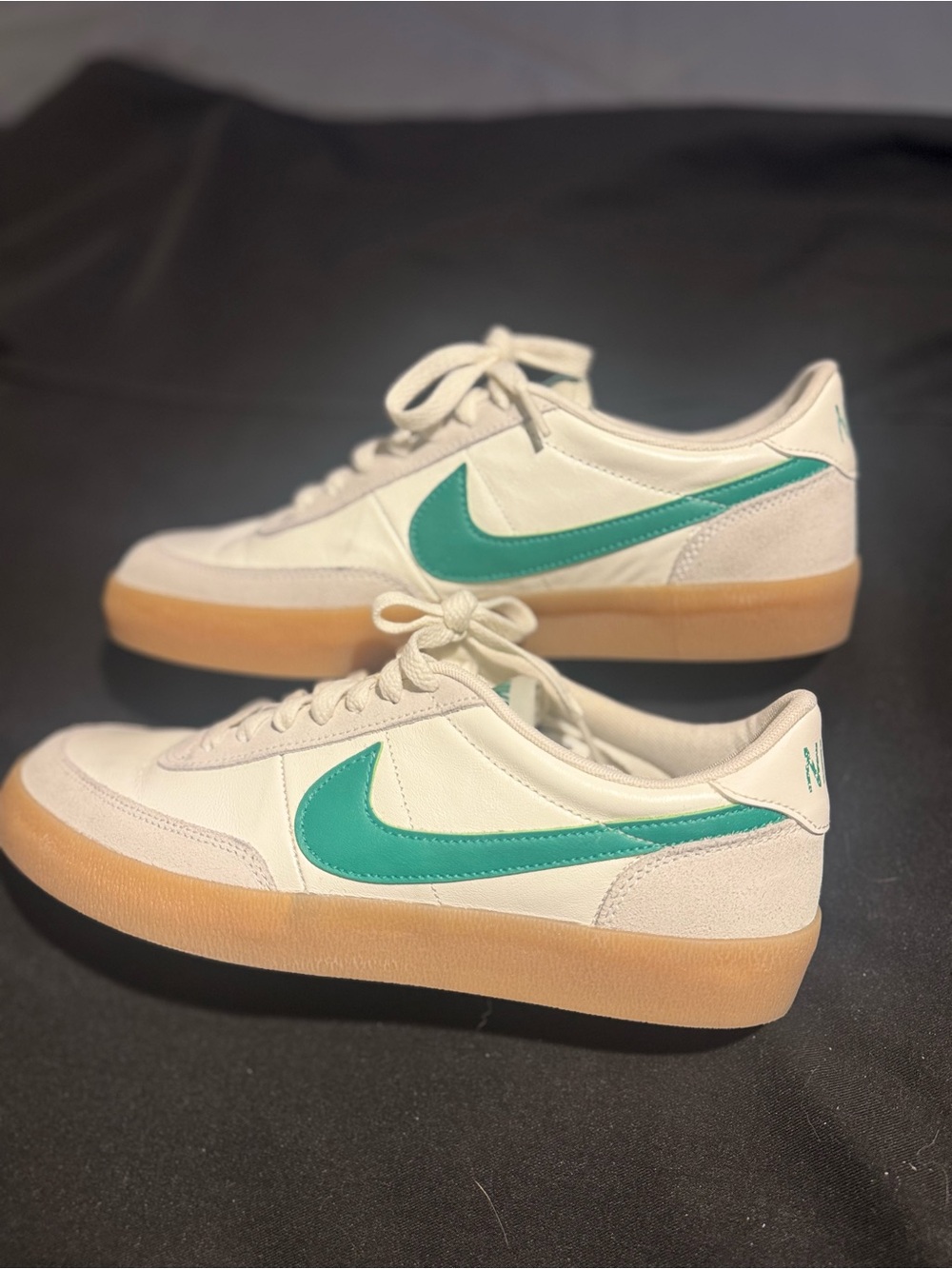 Nike men’s Cream Sneakers with Teal-Green Swoosh